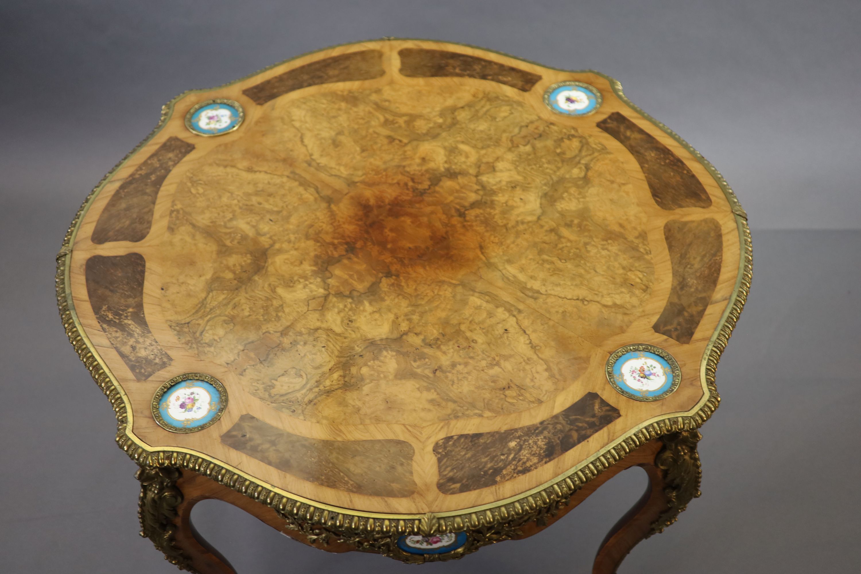 A Victorian Louis XV style ormolu mounted walnut centre table, W.122cm H.76cm